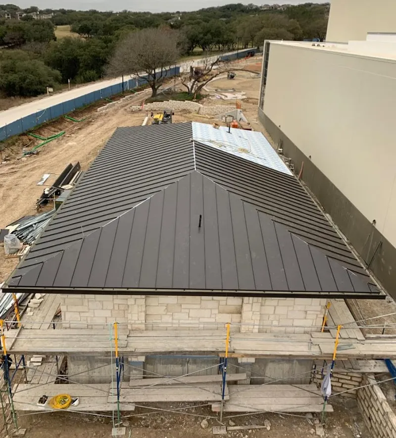 Metal roof new construction with scaffolding in Pasadena